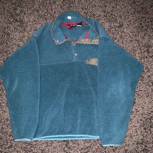 Blue Patagonia fleece sweater